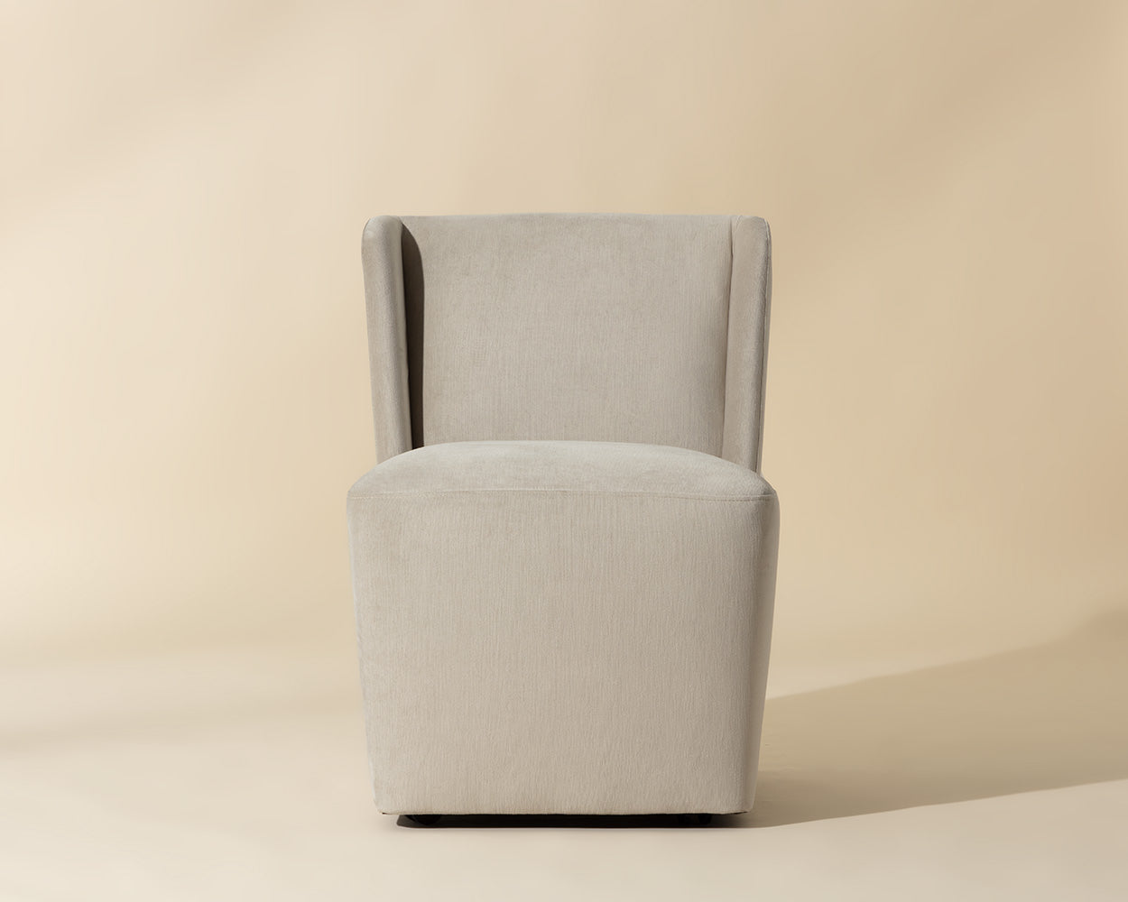 Amita Wheeled Dining Chair - Piccolo Prosecco